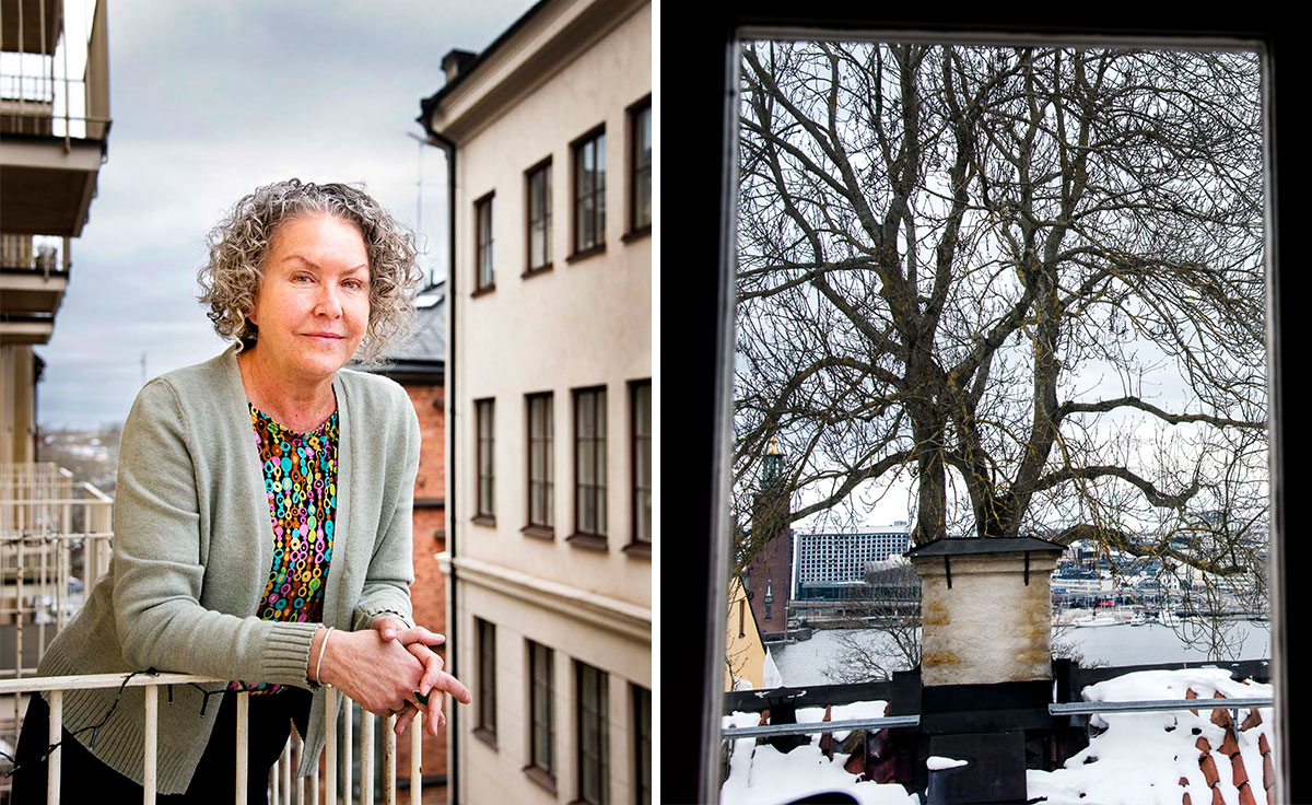 Susanne Larsson på sin balkong med utsikt mot Stadshuset.
